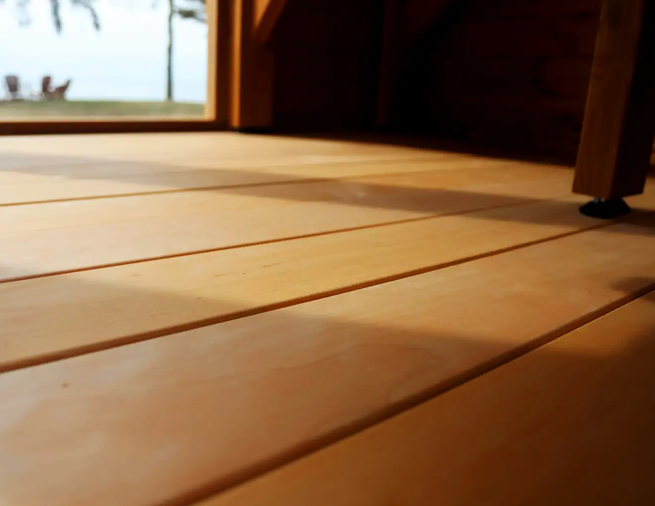 A close shot of the thermally modified wood floor in a Mod Pod Sauna.