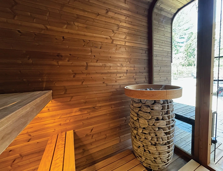 inside of sauna square with HUUM heater