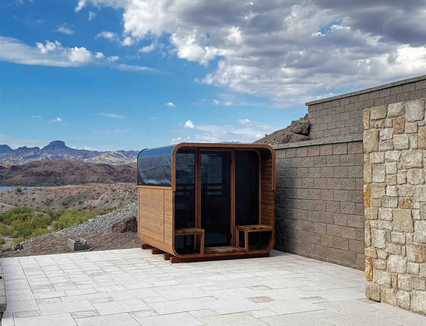 exterior view of no40 square sauna with mountains in background