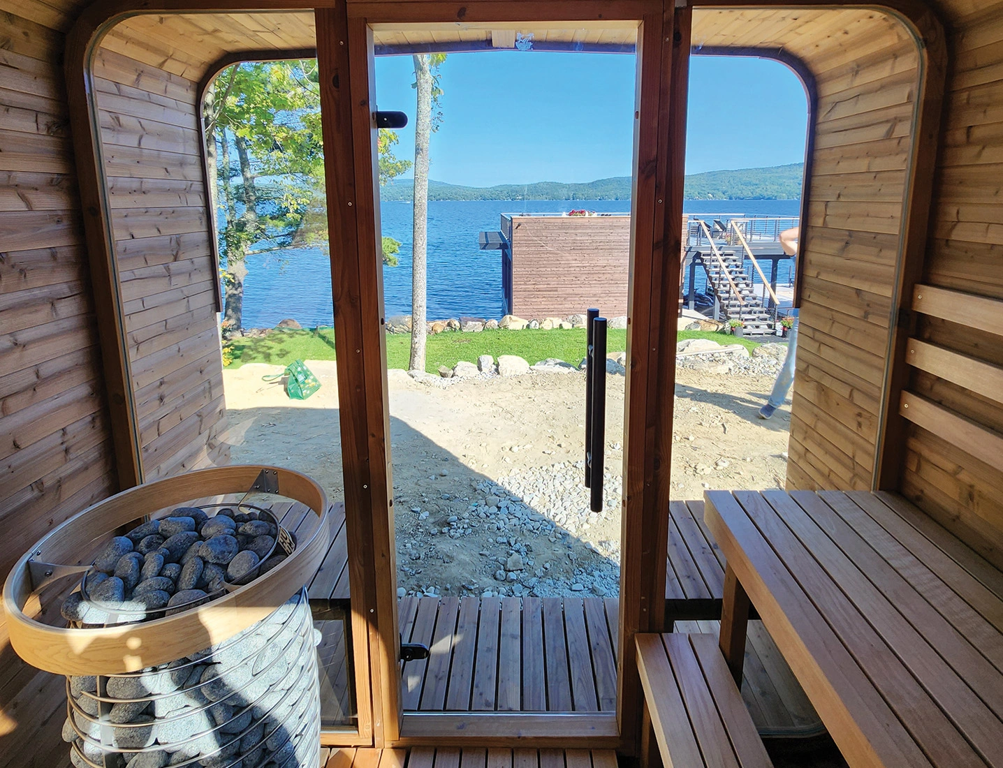inside looking out front door and windows of square sauna